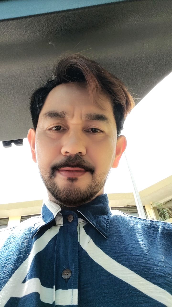 Zainy Husin — Founder & Director