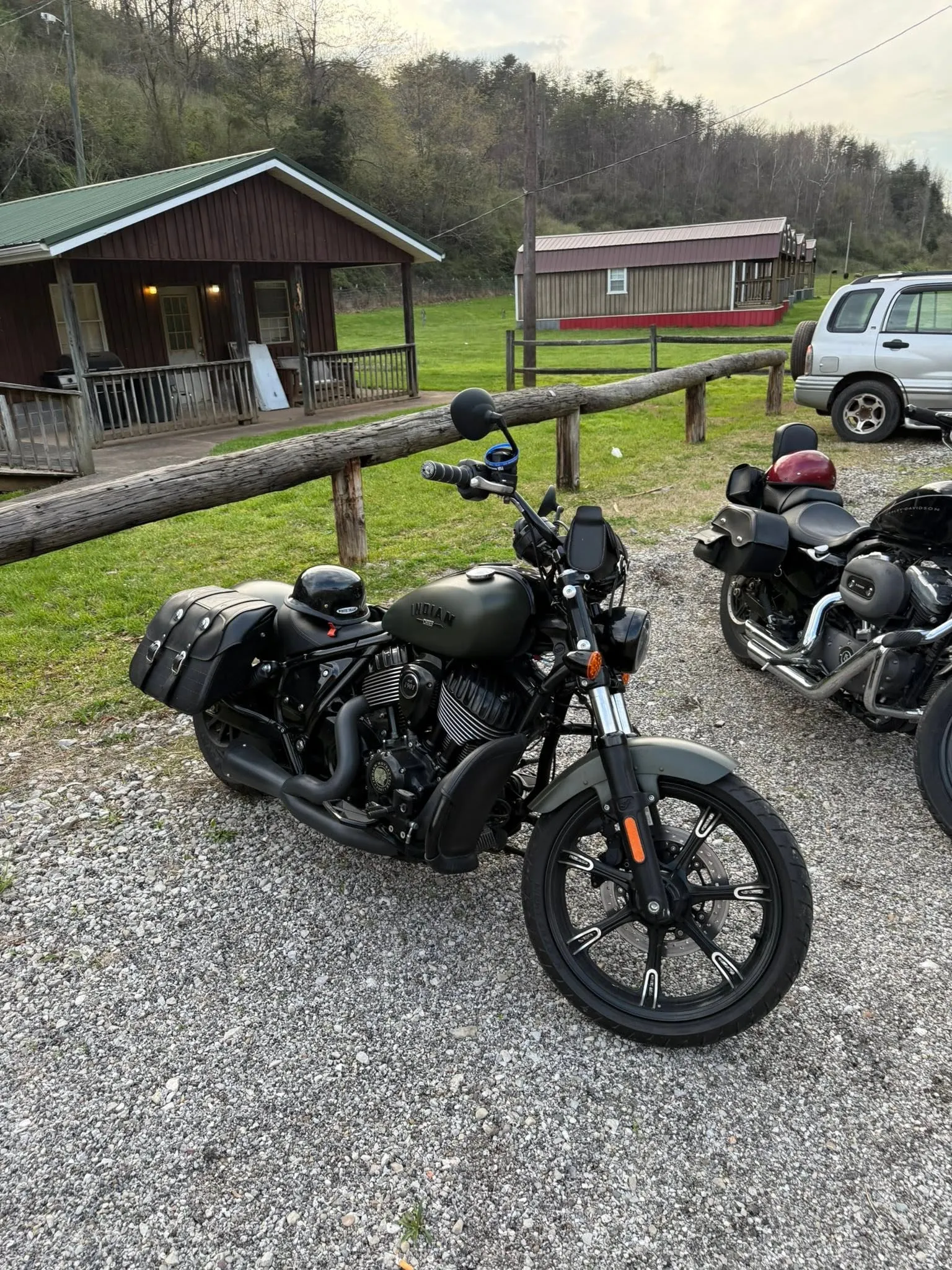 Indian motorcycle parked near The Farm cabin rental
