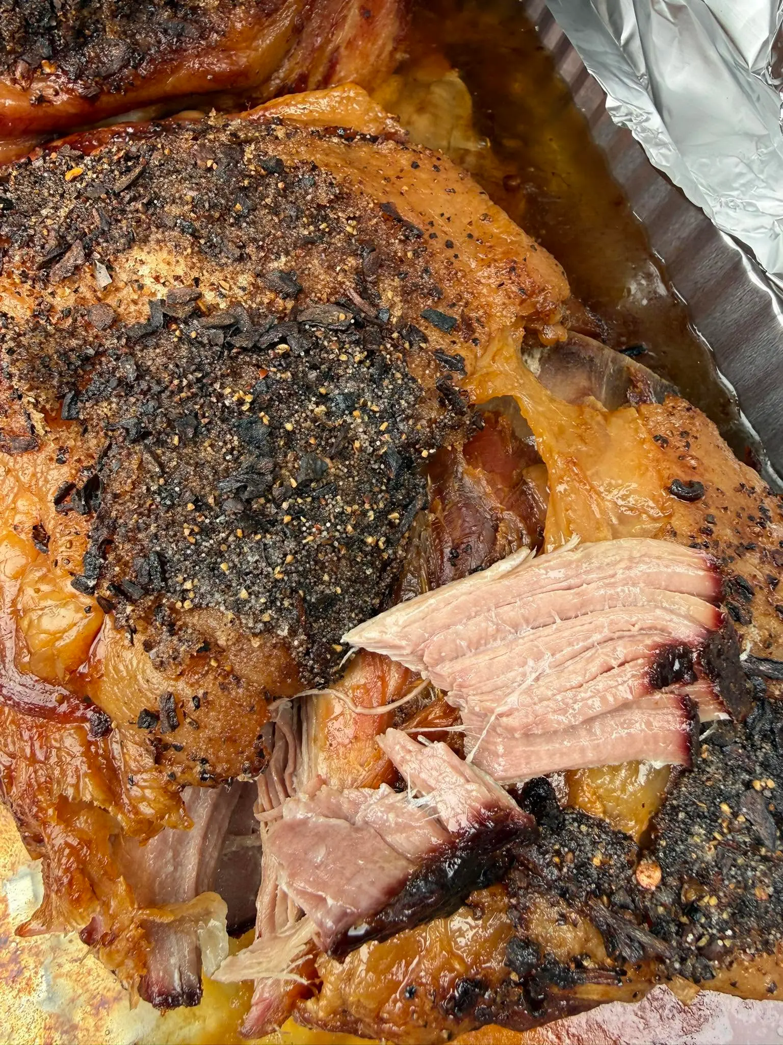 Smoked pulled pork fresh off the smoker at The Farm Bar & Grill