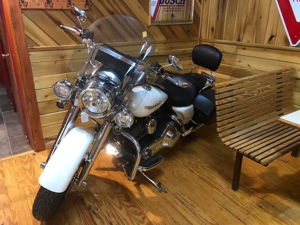Classic Harley Davidson motorcycle inside The Farm Bar & Grill