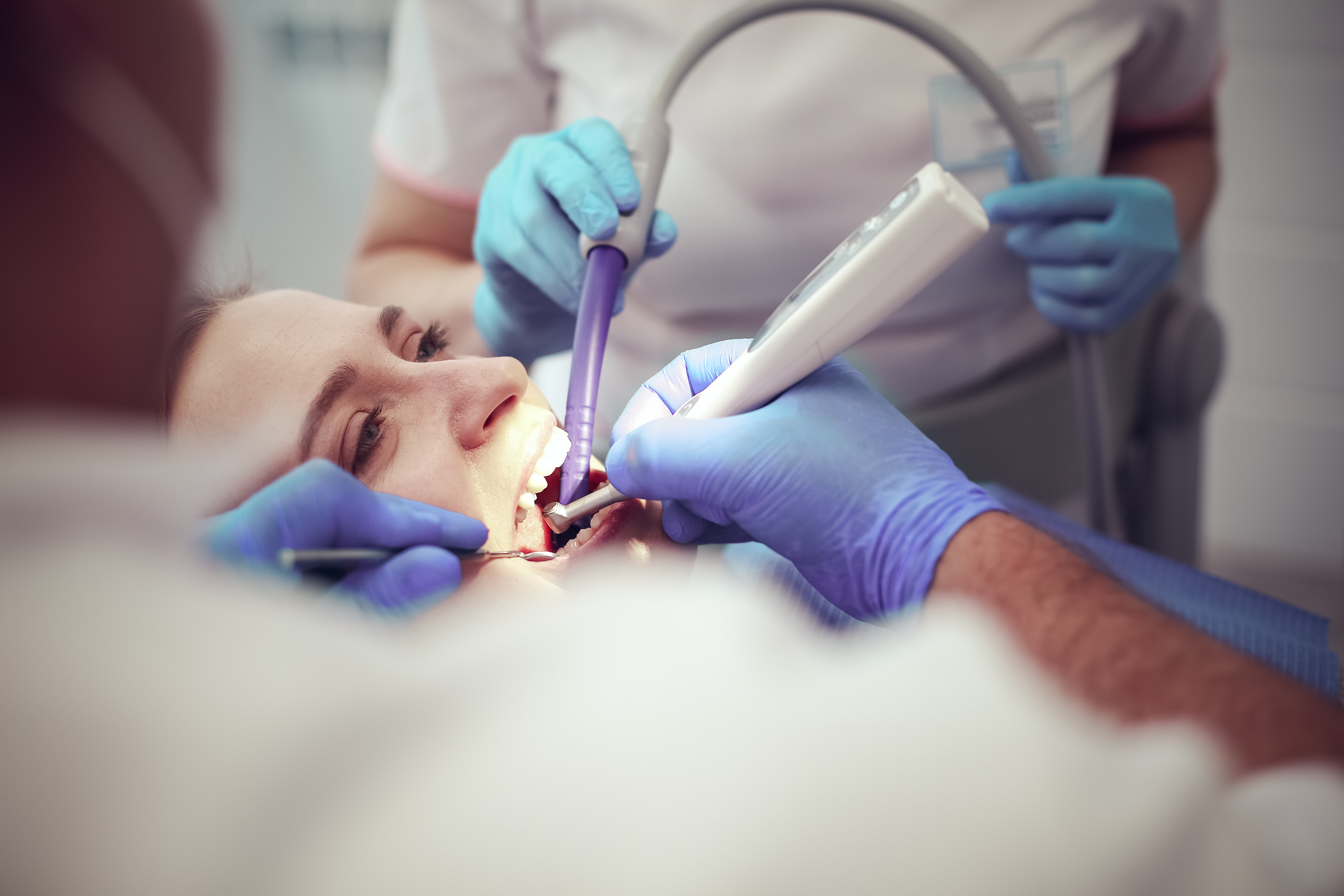 Dr George Papadakis consulting with a patient at Beaulieu Dental clinic