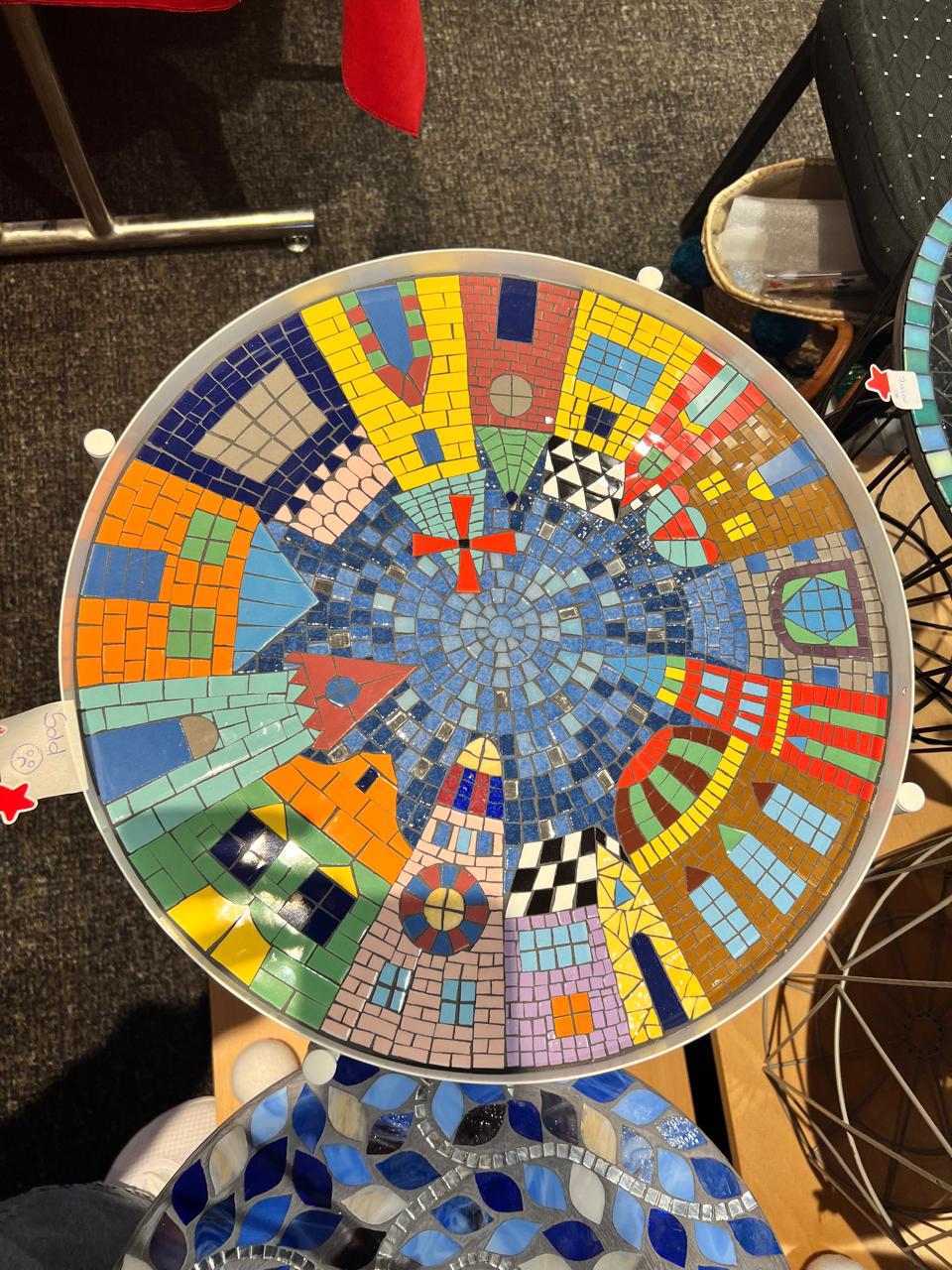 Andalusian-inspired mosaic table with blue and white interlacing patterns