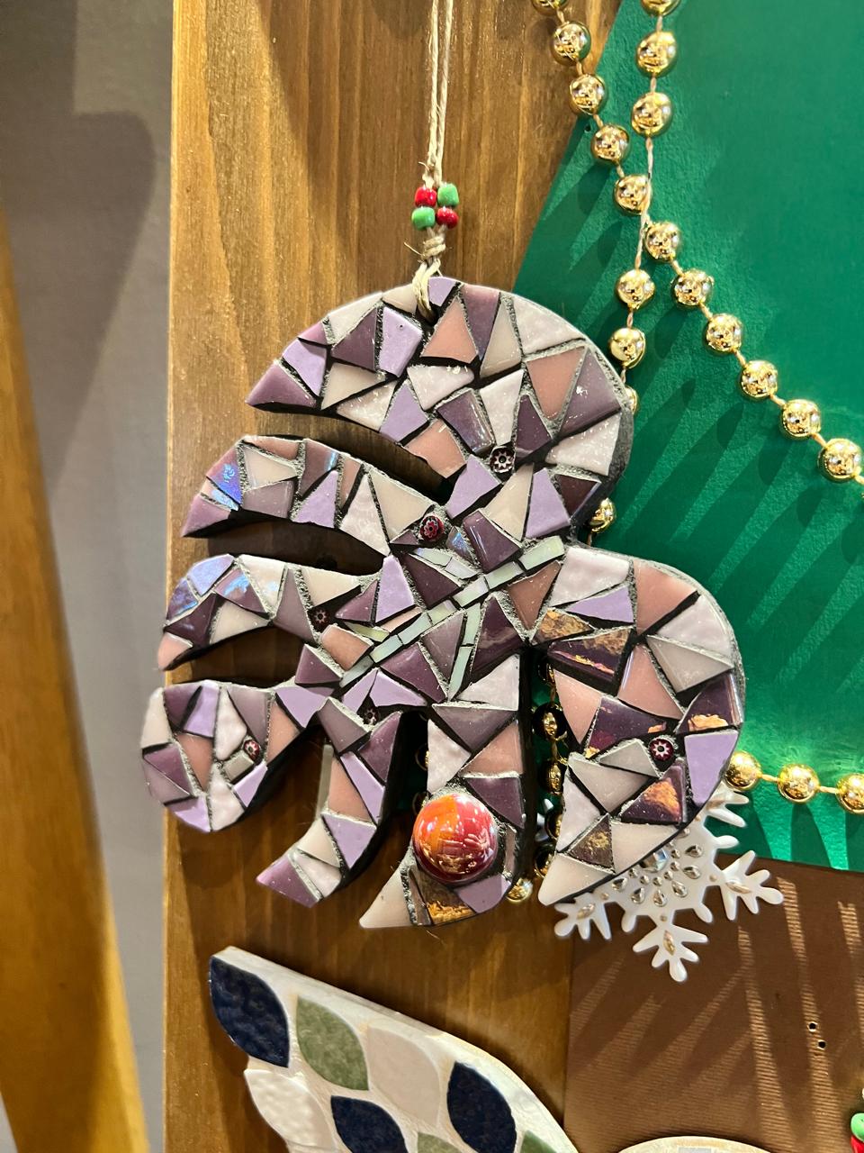 Artisanal mosaic wall decoration with warm and natural color palette