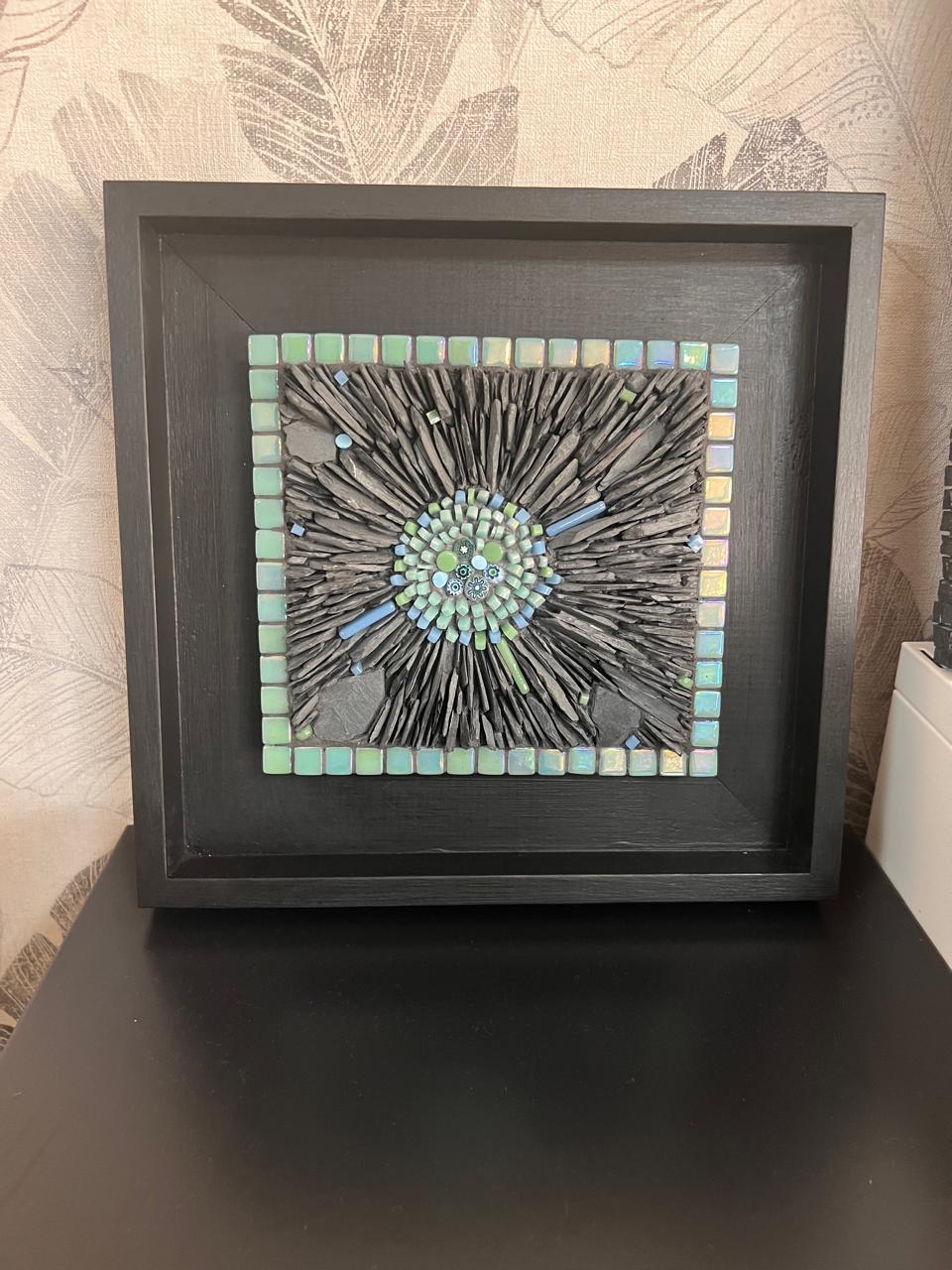 Low mosaic table with cherry blossom motifs in pink white and tender green tesserae