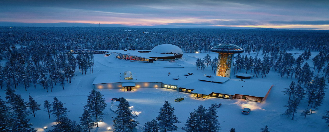 Kelo-Glass Igloo — Exterior at night with aurora views