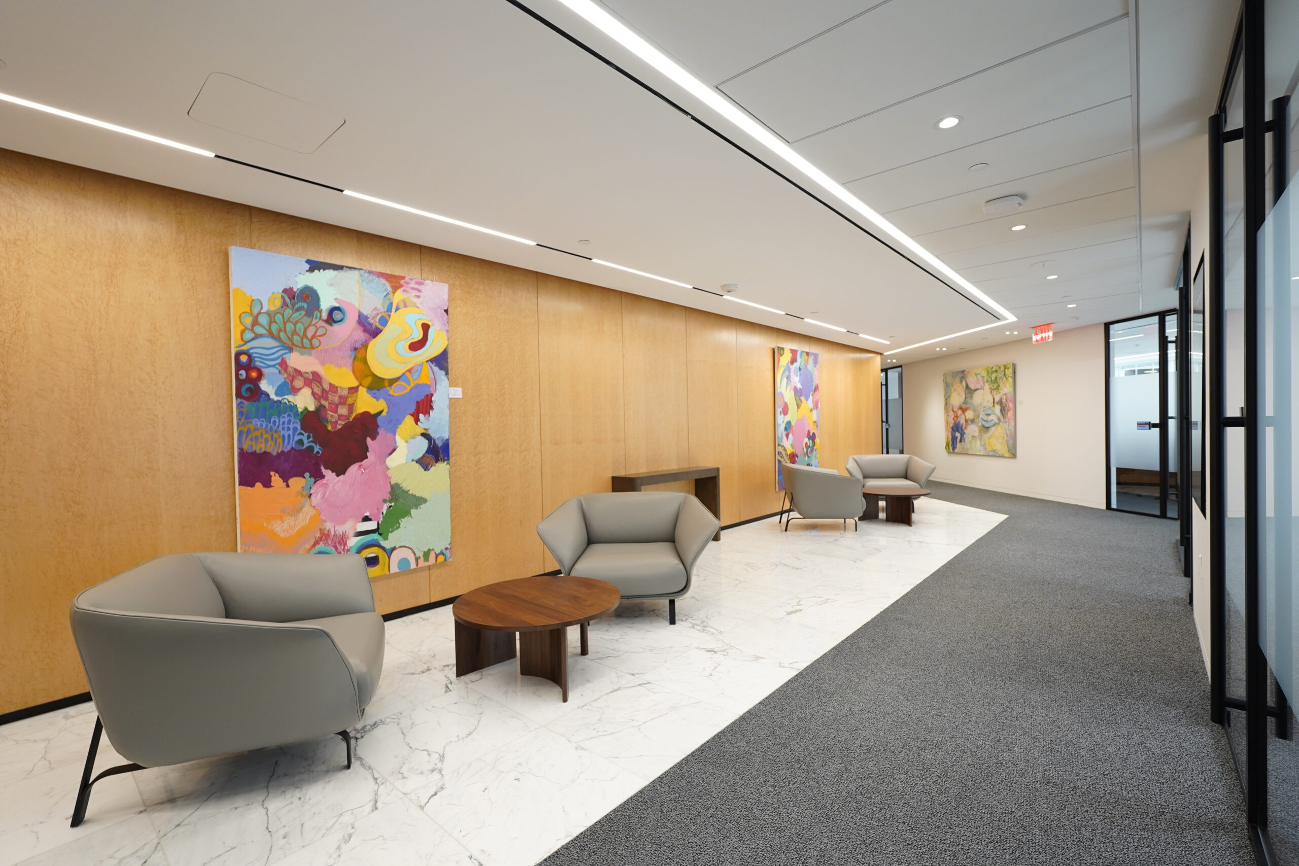 Evercore — glass partition system and metal detailing