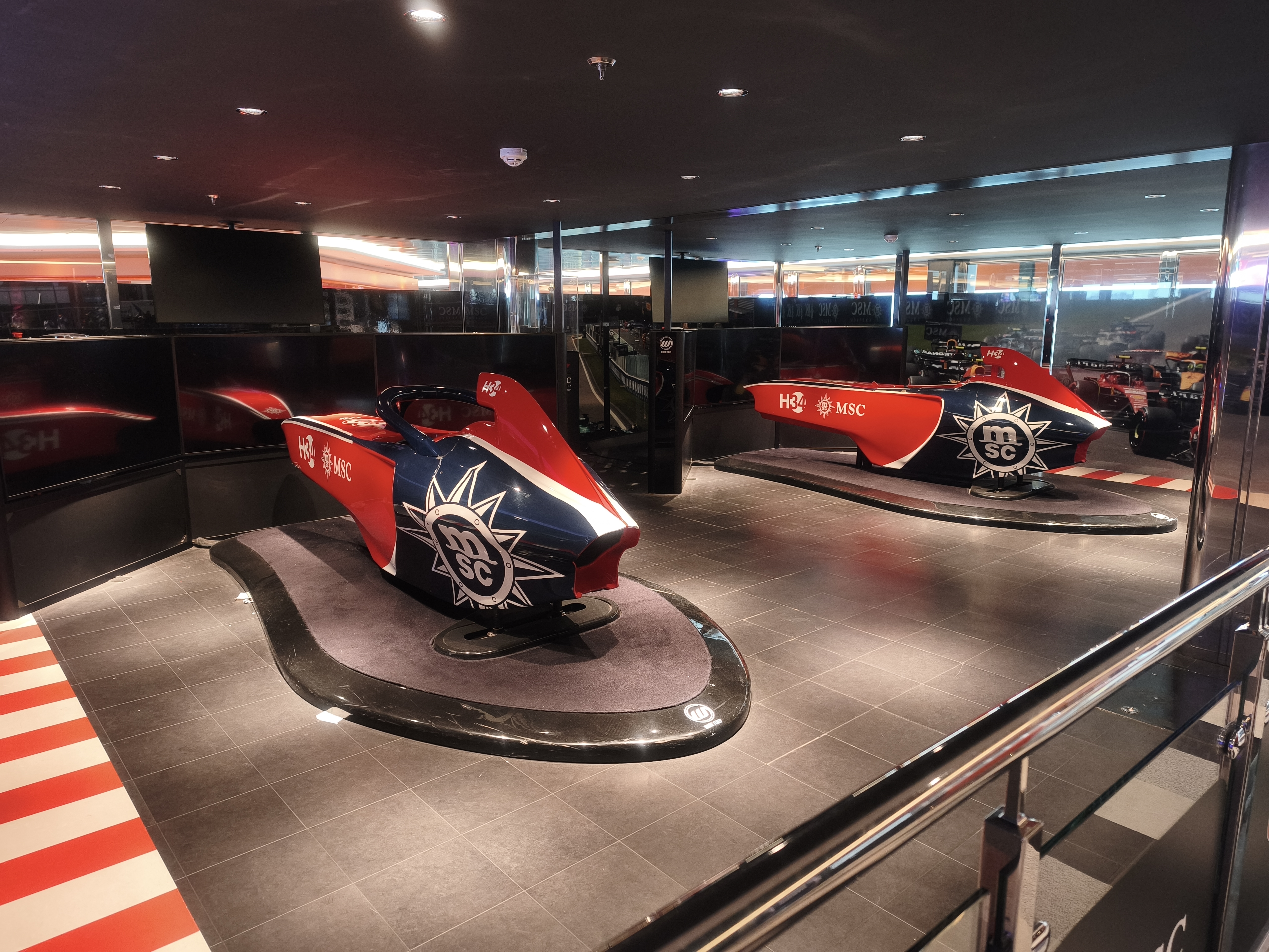 MSC Virtuosa high-tech amusement arcade with neon lighting and modern gaming equipment