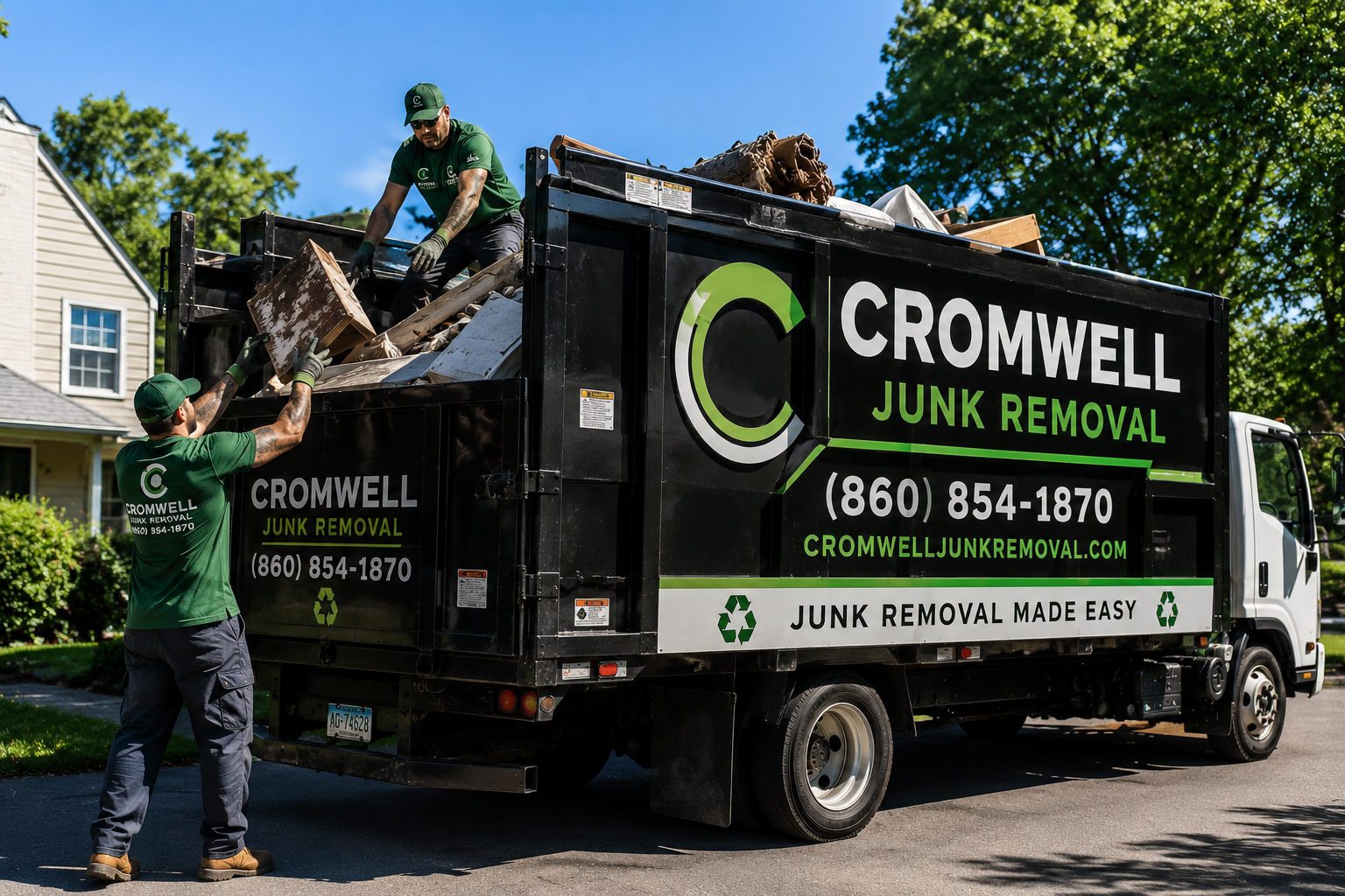 Clean residential junk removal truck on a suburban street