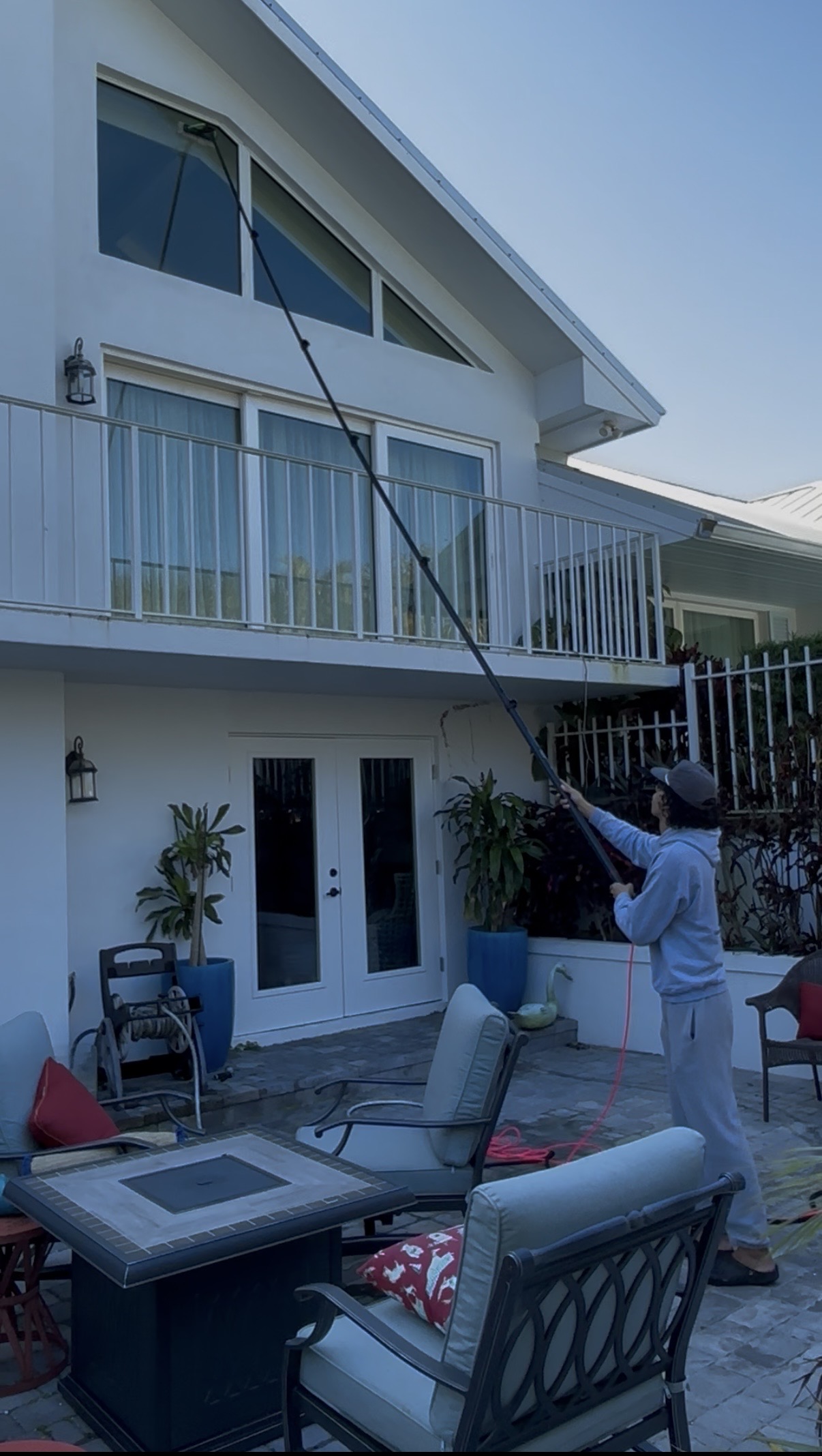 Coastal Clear team delivering professional exterior cleaning results
