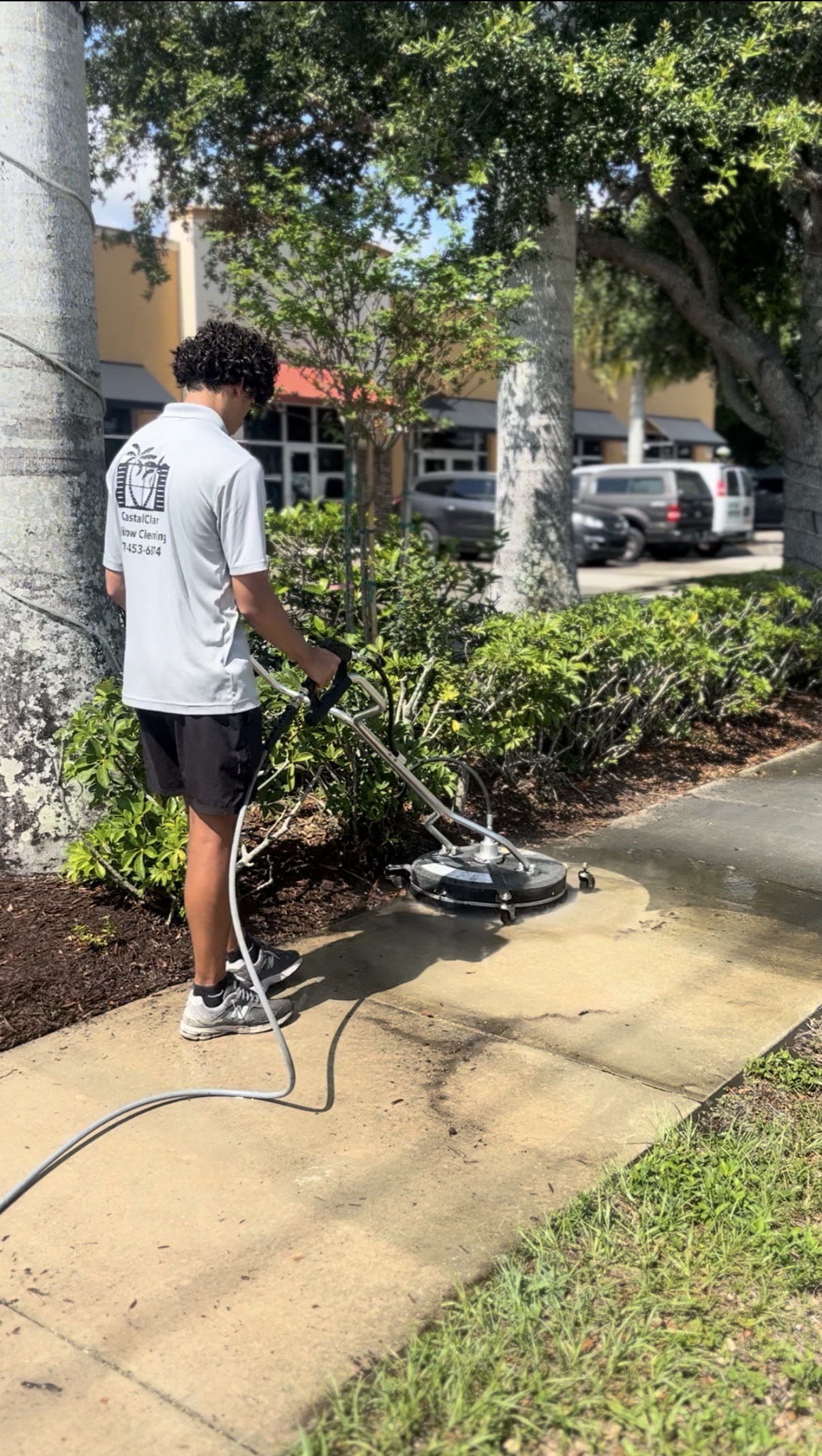 Coastal Clear team at work on a Treasure Coast property