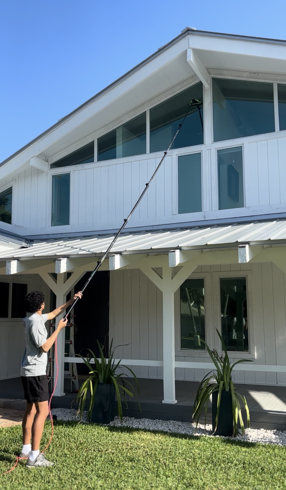 Coastal Clear team delivering exterior cleaning results