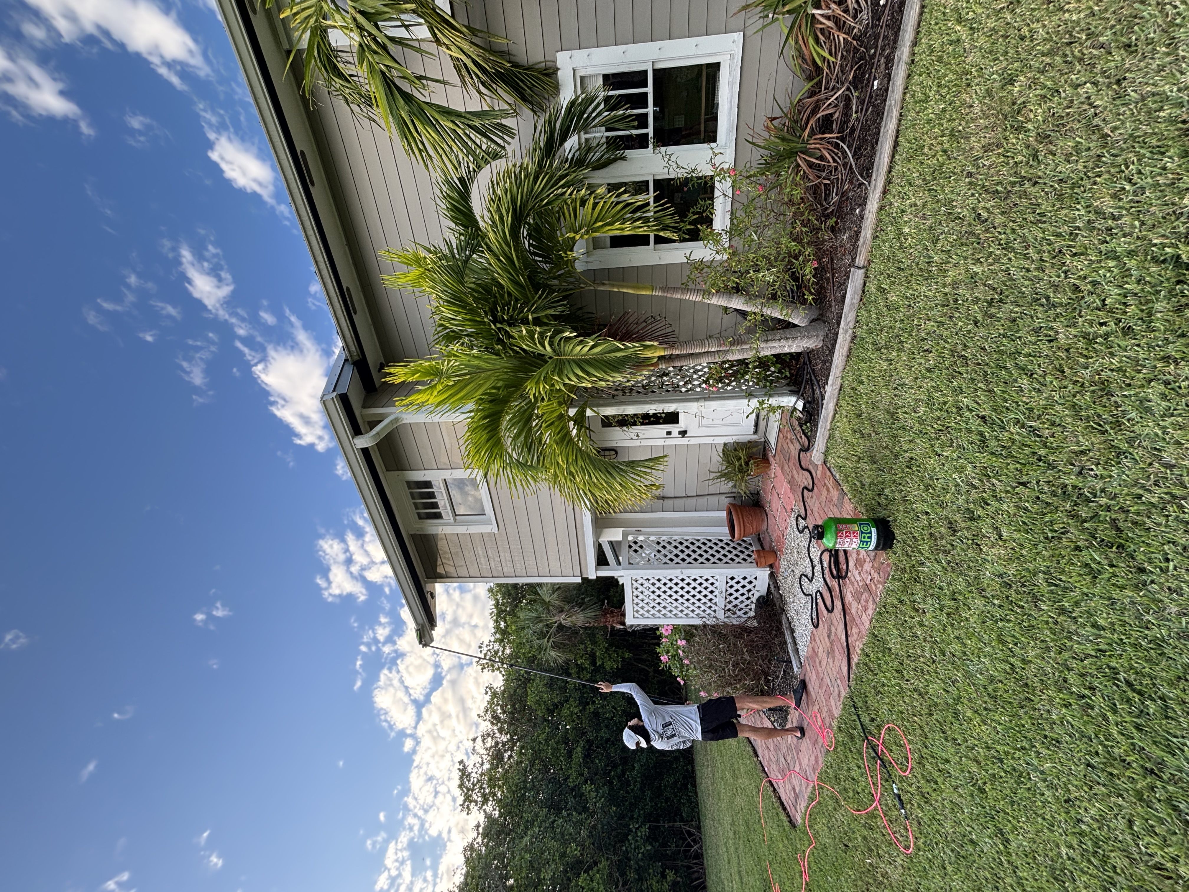 Coastal Clear team cleaning exterior windows in Vero Beach