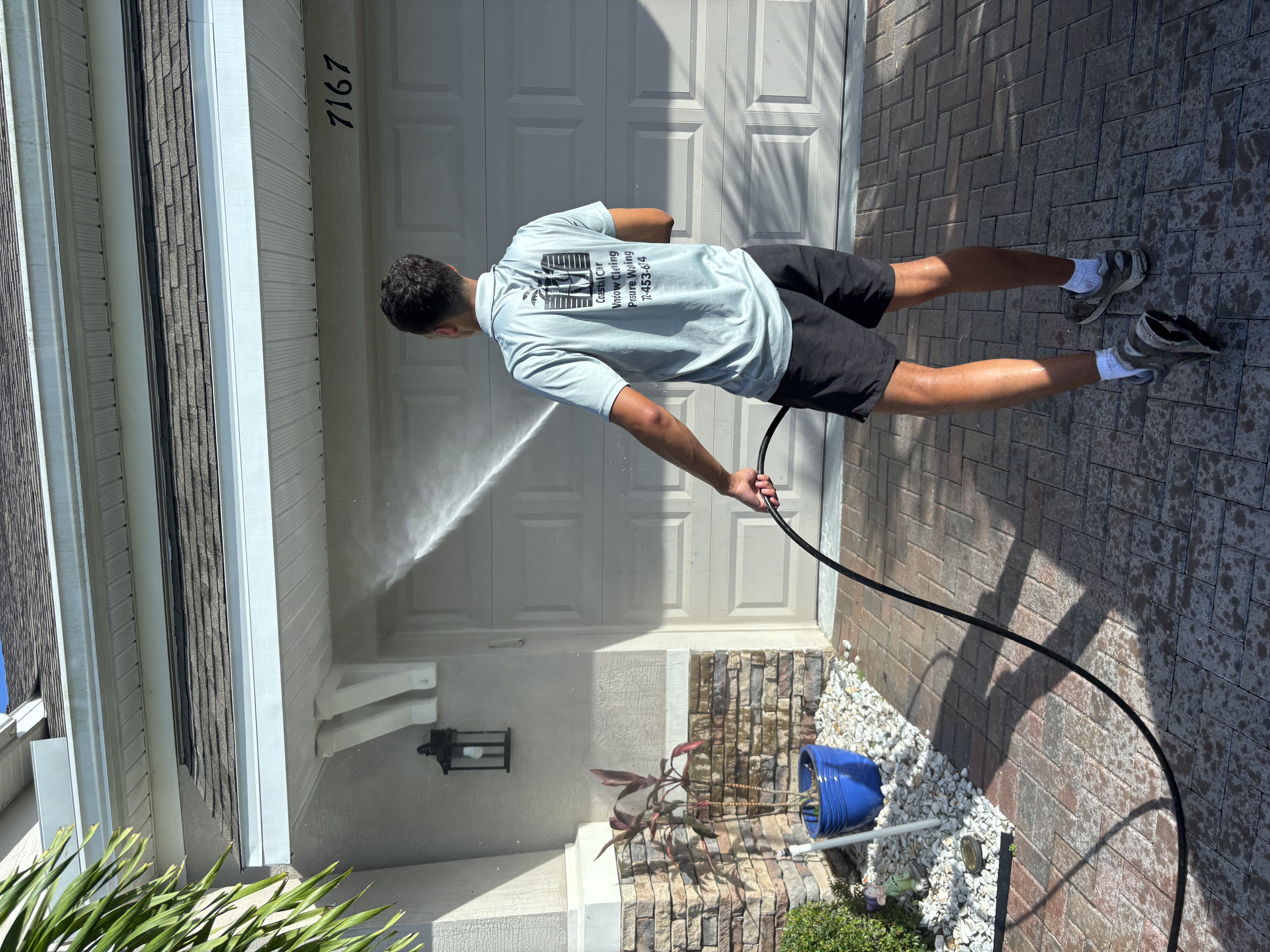 Coastal Clear team providing exterior cleaning service